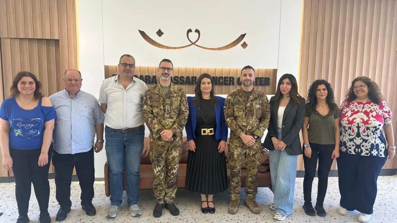 Barbara Nassar Cancer center event with Italian Colonel